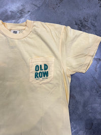 Thumbnail for Old Row Golf Cart Optional Short Sleeve T-Shirt. Man drinking on the golf course.