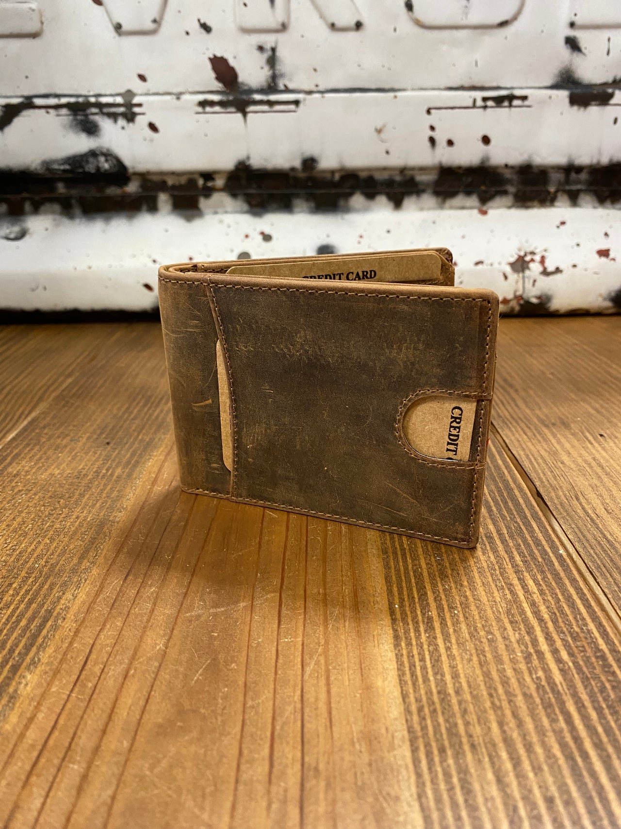 Worn Brown Leather Bifold Wallet