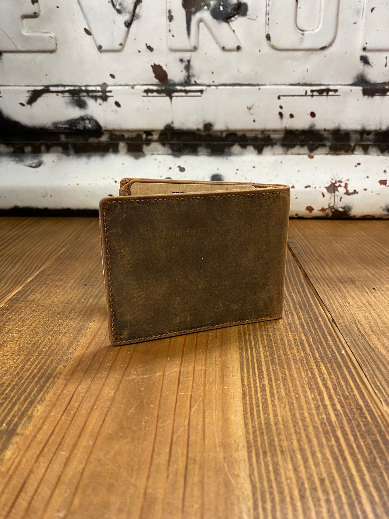 Worn Brown Leather Bifold Wallet