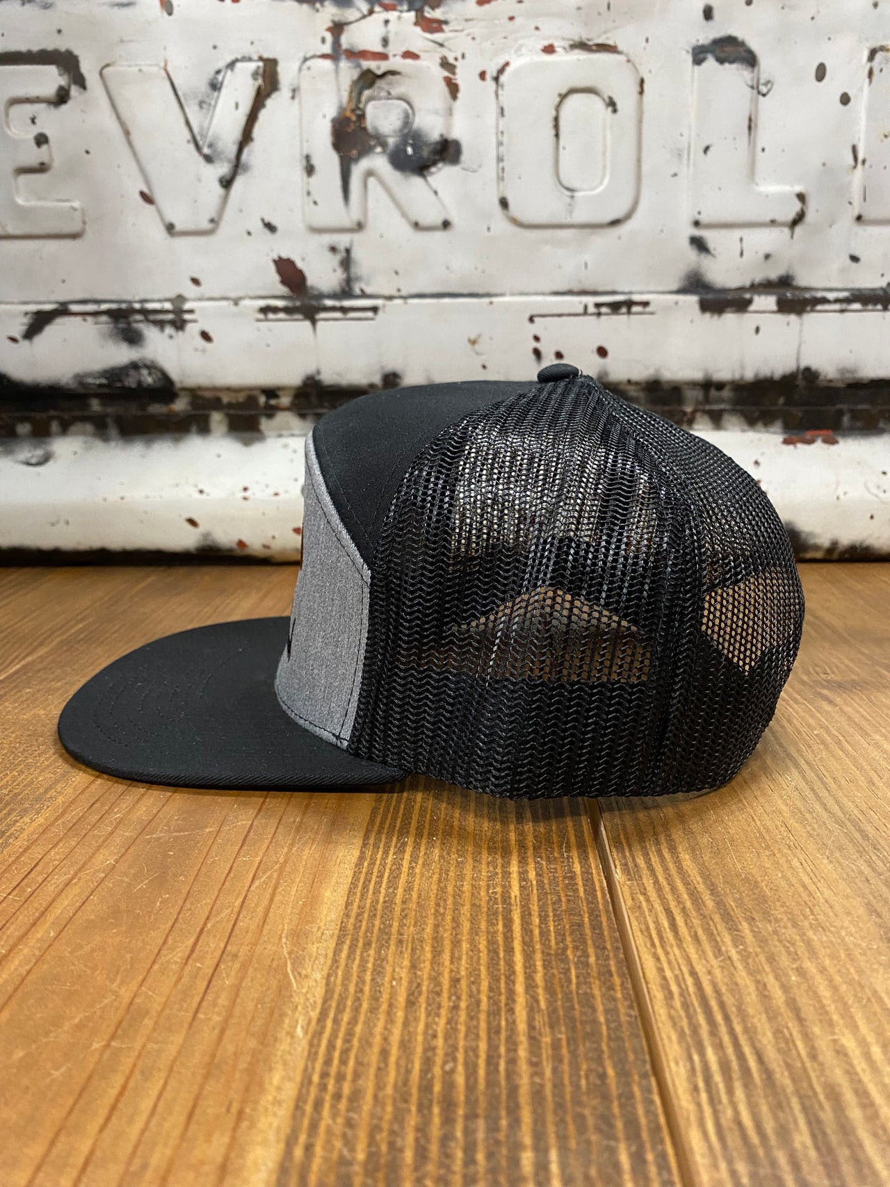 Heather Grey/Black Southern Local Wood Duck 7 Panel Cap - A blend of classic style and Southern charm. Distinctive wood duck embroidery adds character to this meticulously crafted cap. Comfortable seven-panel construction, premium materials, and versatile design for city or outdoor adventures.