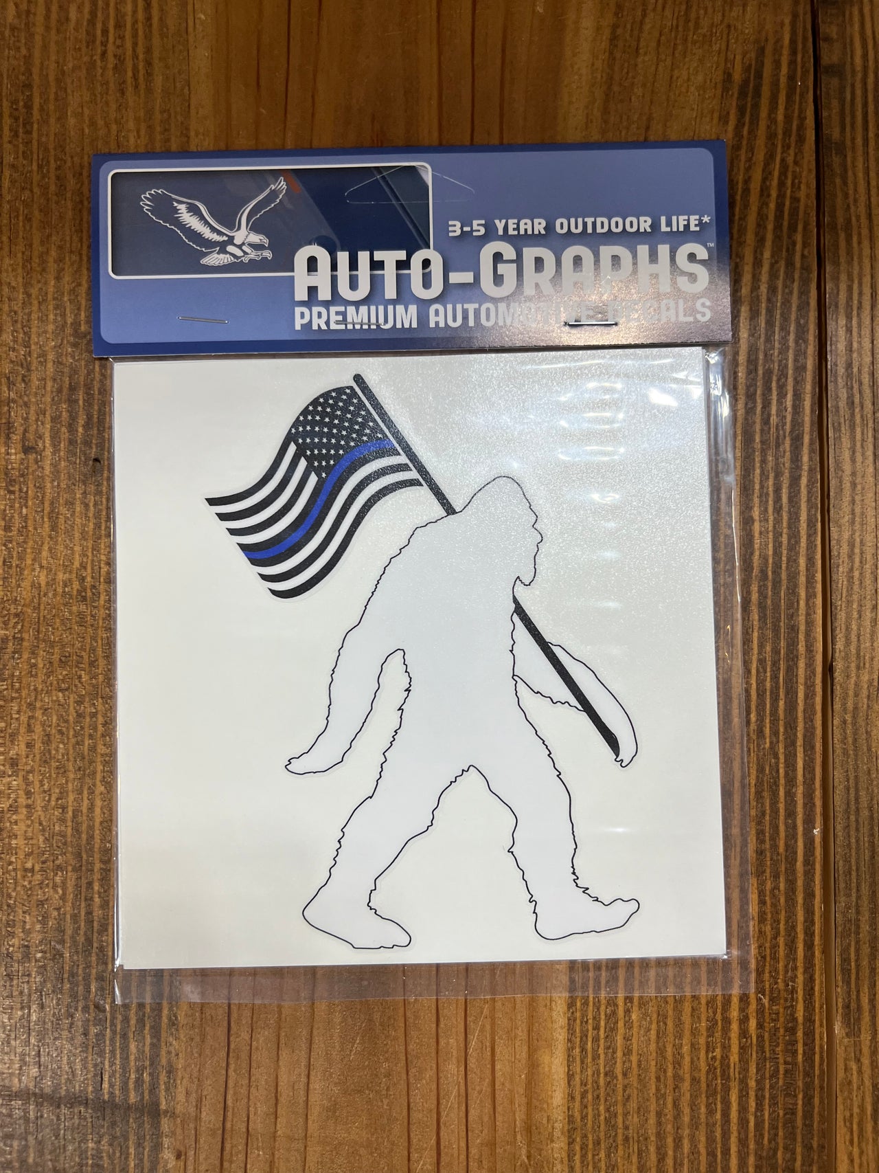 Bigfoot Carrying Blue Line Flag Decal