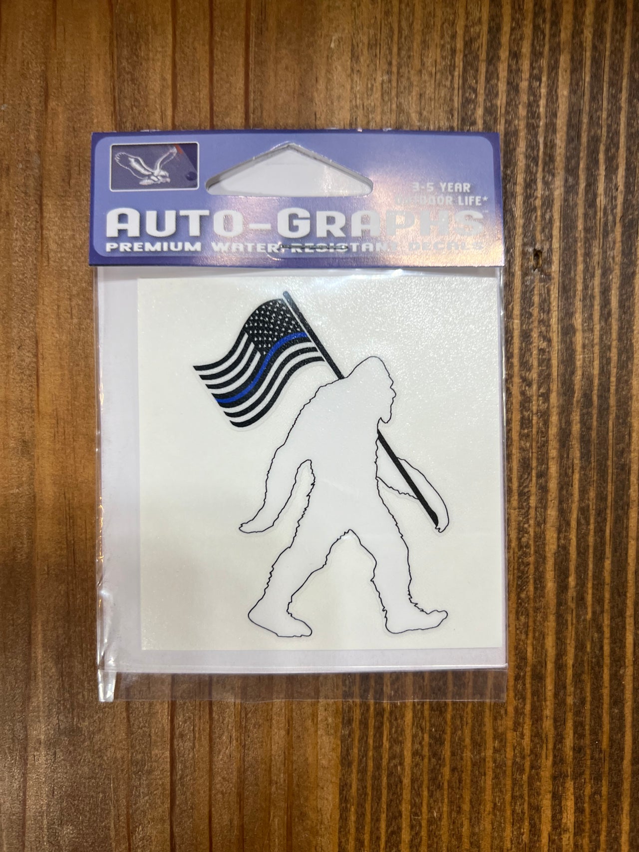 Bigfoot Carrying Blue Line Flag Decal