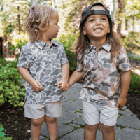 Thumbnail for Youth Performance Polo - Classic Deer Camo