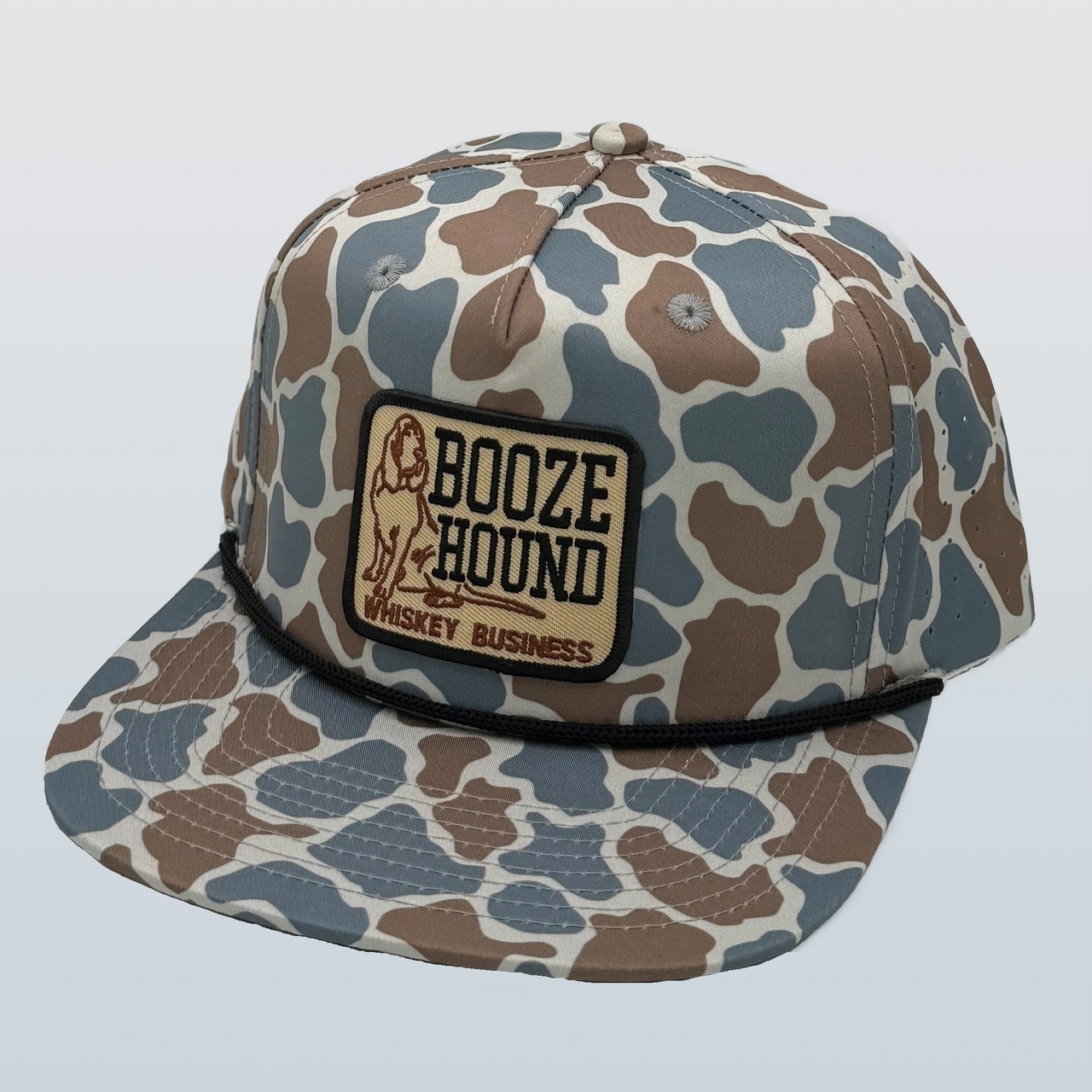  "Blue OS Camo Booze Hound 5 Panel Performance Cap: A stylish and functional cap featuring a modern blue camouflage pattern. Built for both urban and outdoor adventures, this cap offers durability, moisture-wicking technology, and a secure fit. Perfect for those who embrace an active lifestyle with a touch of bold style."